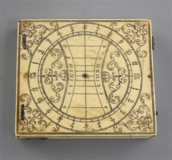 An antique ivory calendar dial